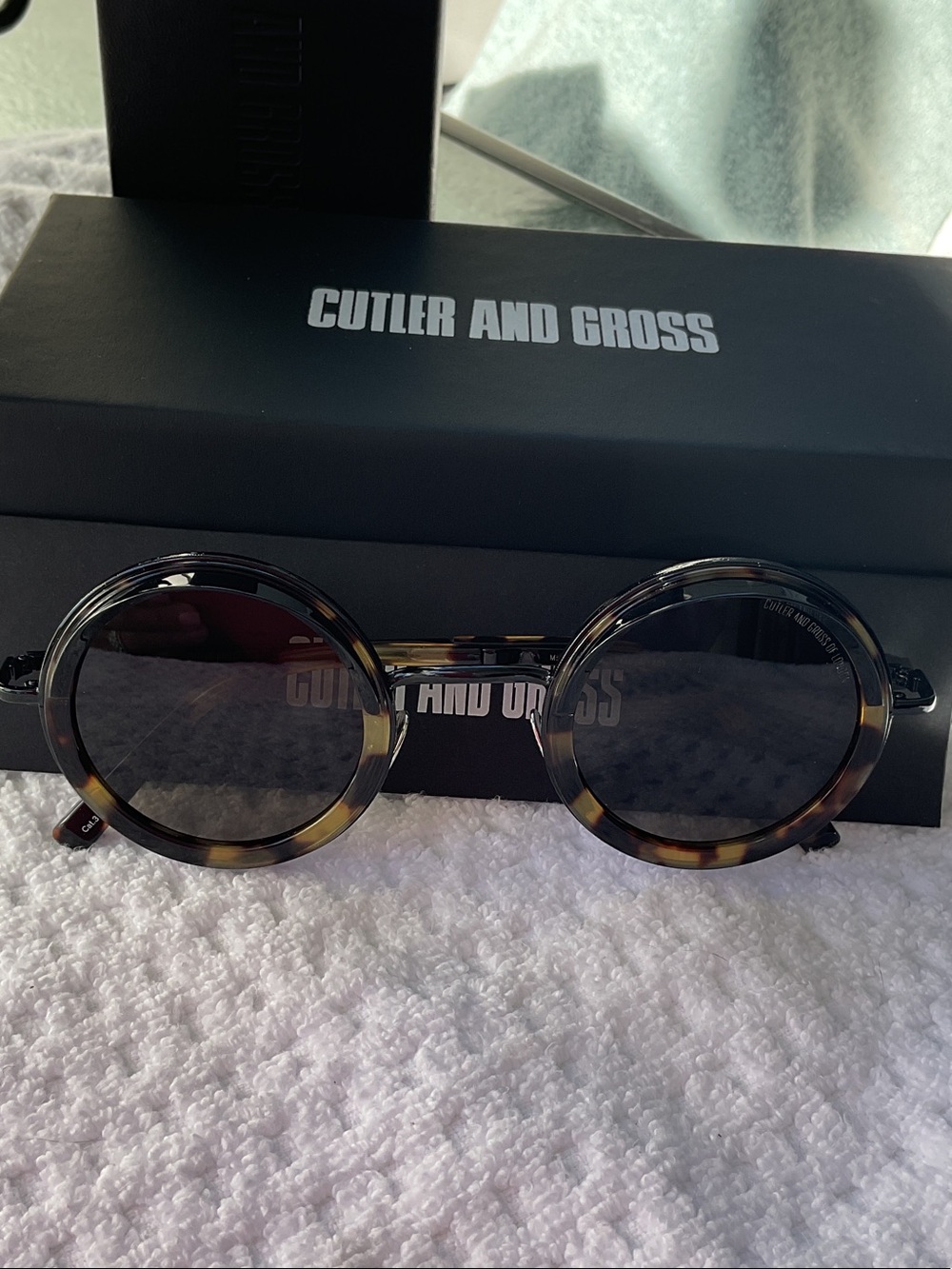 Cutler and Gross Men's Round Tortoiseshell Sunglasses with Blue Lenses